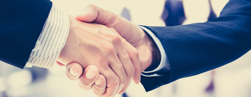 Handshake for hotel sales acquisition concept
