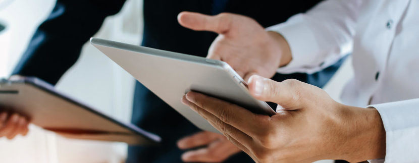 Hotel employee using tablet